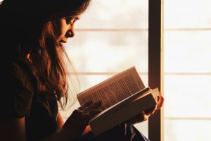 How to get your book out there Bubok - Woman Reading a book - How to Publish a Book