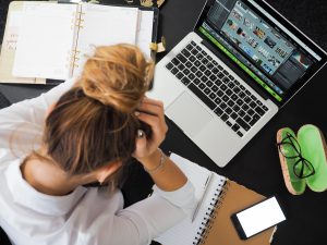 How to get your book out there Bubok - Woman struggling - How to Publish a Book