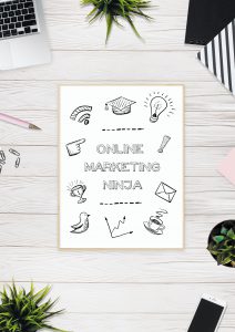 What Self-Publishing Mistakes You Should Avoid desktop showing writing tools and a sheet of paper reading "online marketing ninja"
